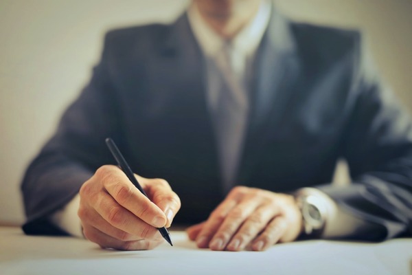 image of attorney with a pen