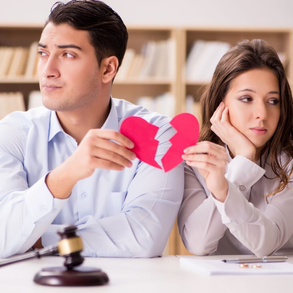Couple holding broken heart