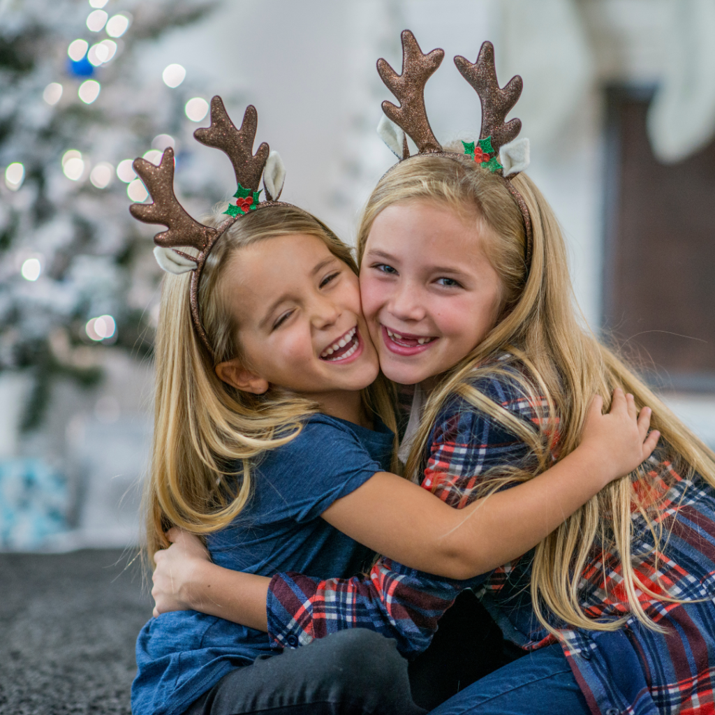 Two little girls hugging