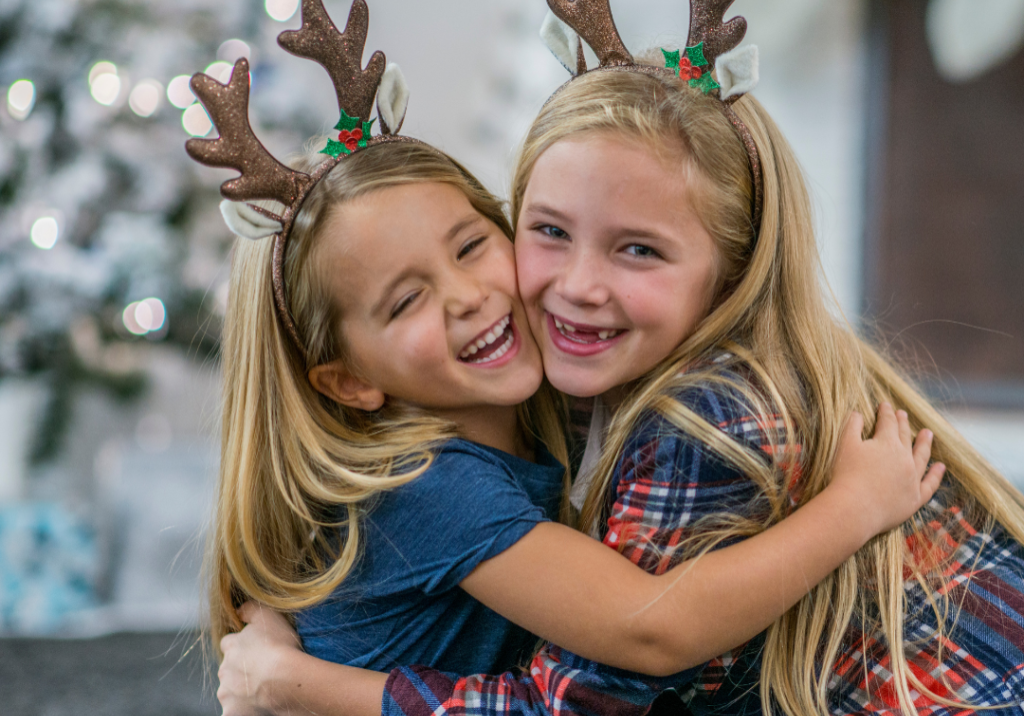 Two little girls hugging