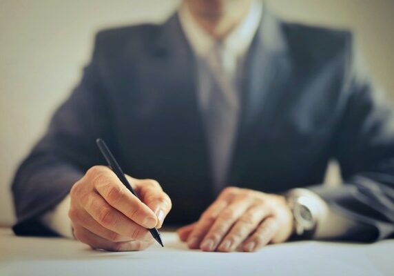 image of attorney with a pen